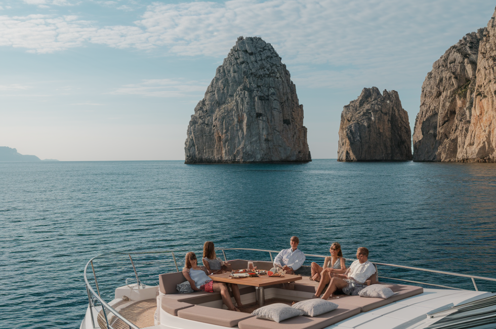 Yacht deck full of people, enjoying the view
